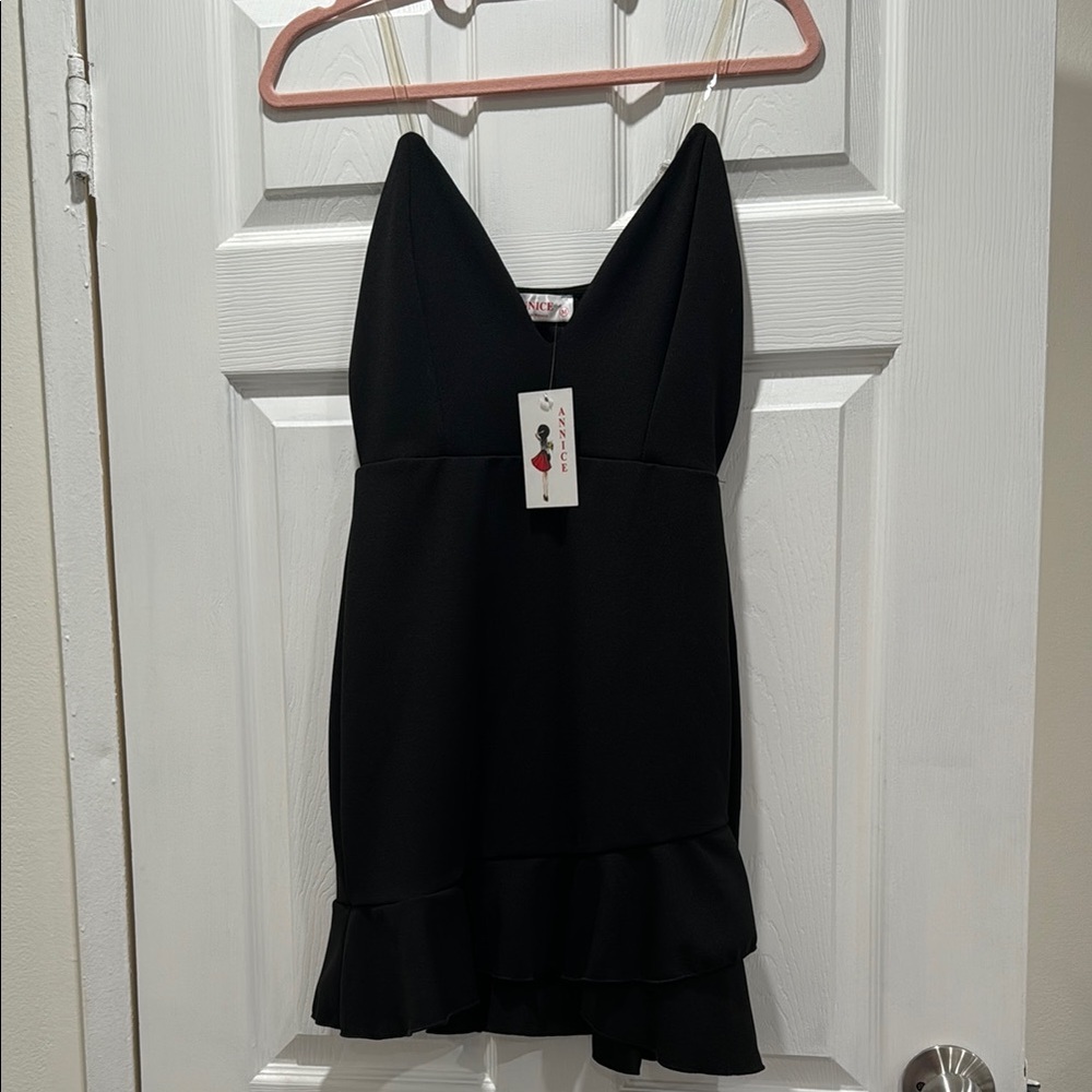 Black Sleeveless Dress with Ruffle Hem